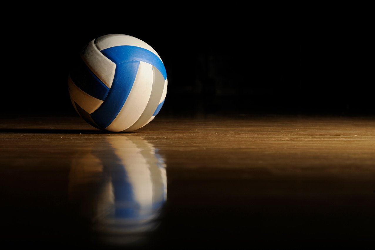 Volleyball on Wood Floor